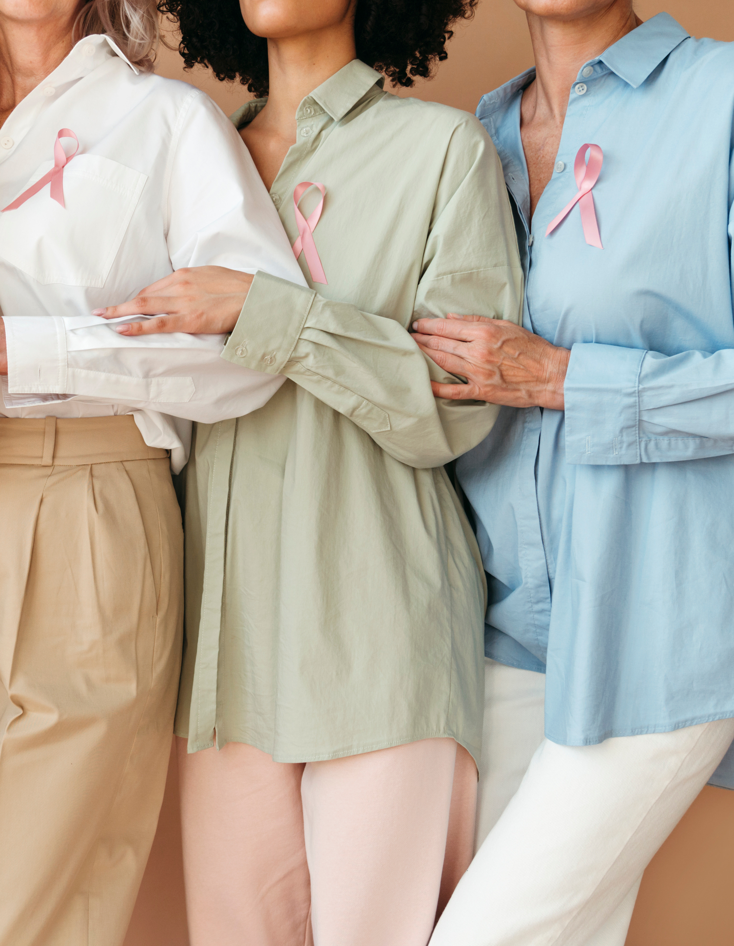 women with pink ribbon